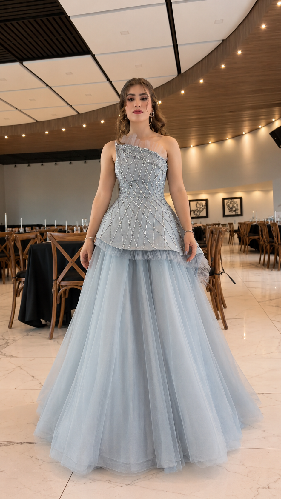 Front view of dusty blue one-shoulder beaded ball gown with full tulle skirt