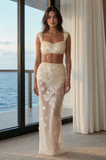 Front view of Ivory sequin applique crop top and sheer maxi skirt set