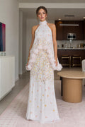 Front view of white floral halter maxi dress