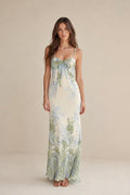 Front view of model wearing ivory floral maxi dress