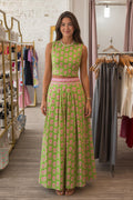 Front view of green floral two-piece crop top and maxi skirt set