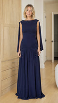 Front view of woman wearing navy blue cape sleeve maxi dress
