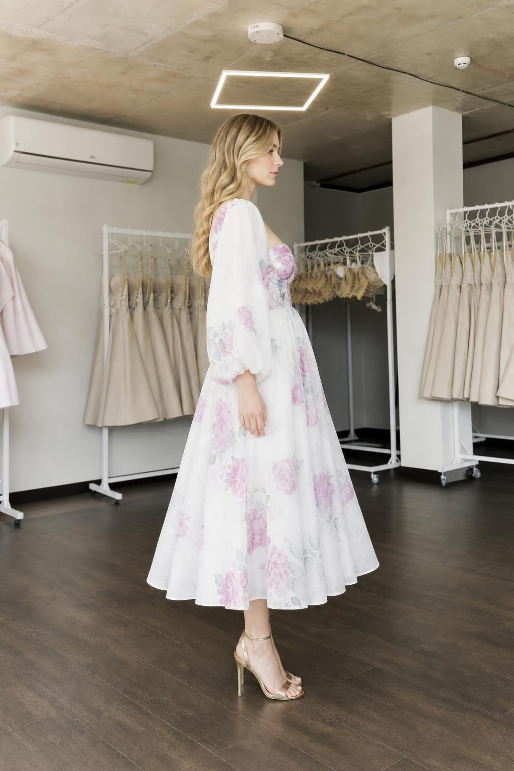 Side view of white floral midi dress