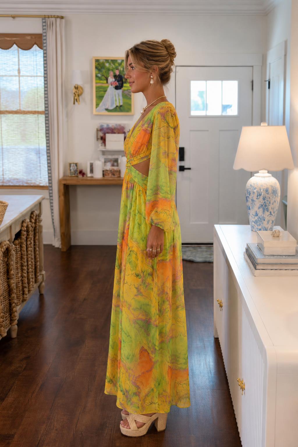 Side profile view of the maxi dress showing sleeve and length