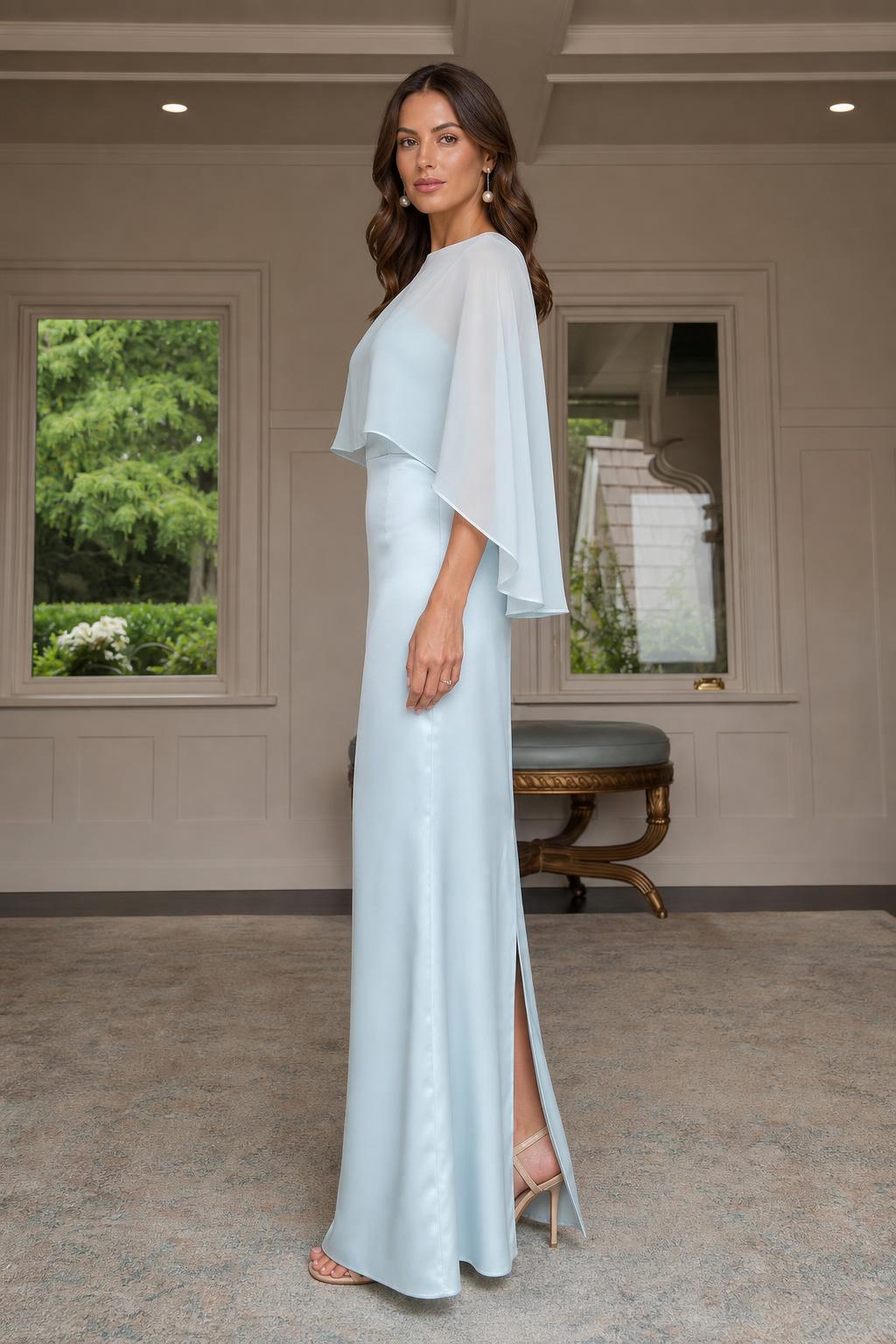 Model wearing light blue evening gown showing side slit and profile