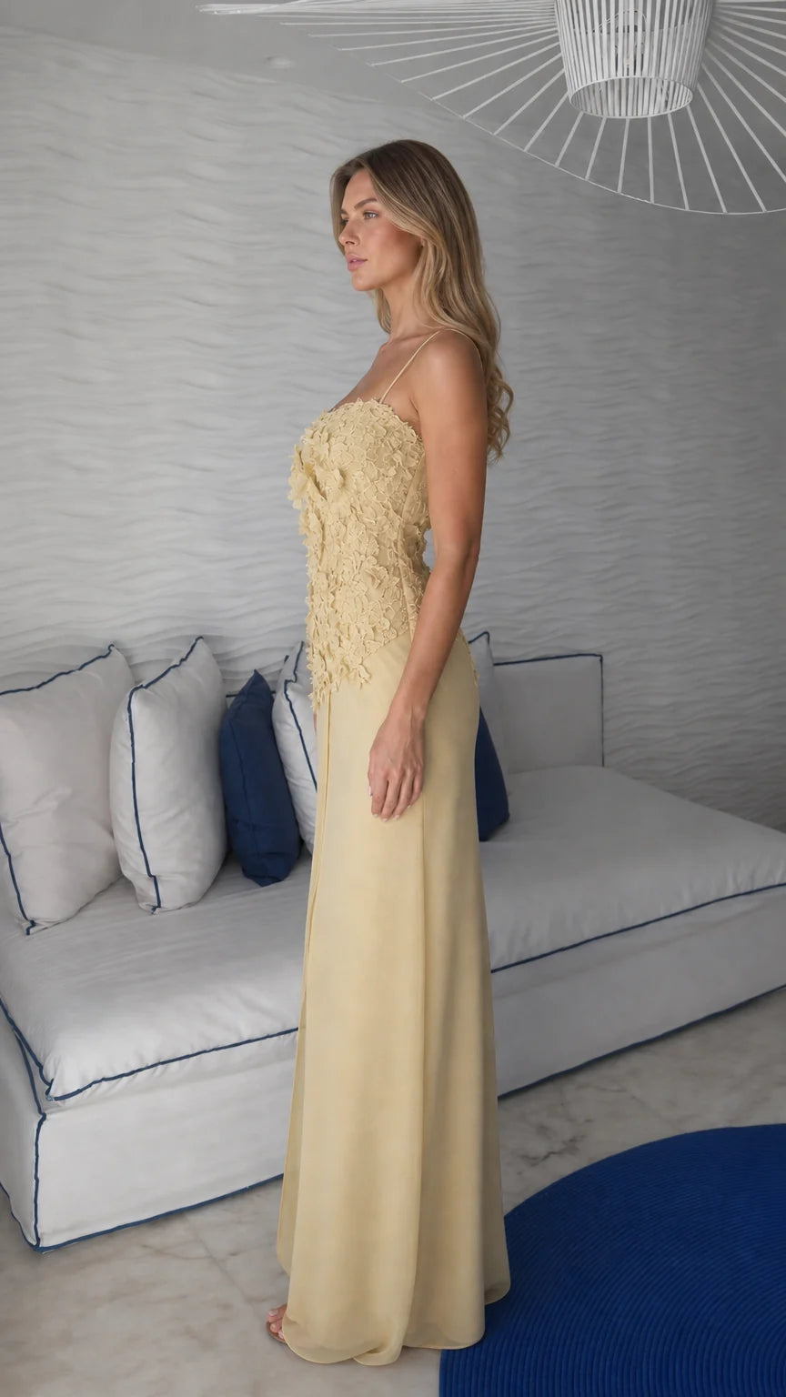 Side profile view of yellow maxi dress