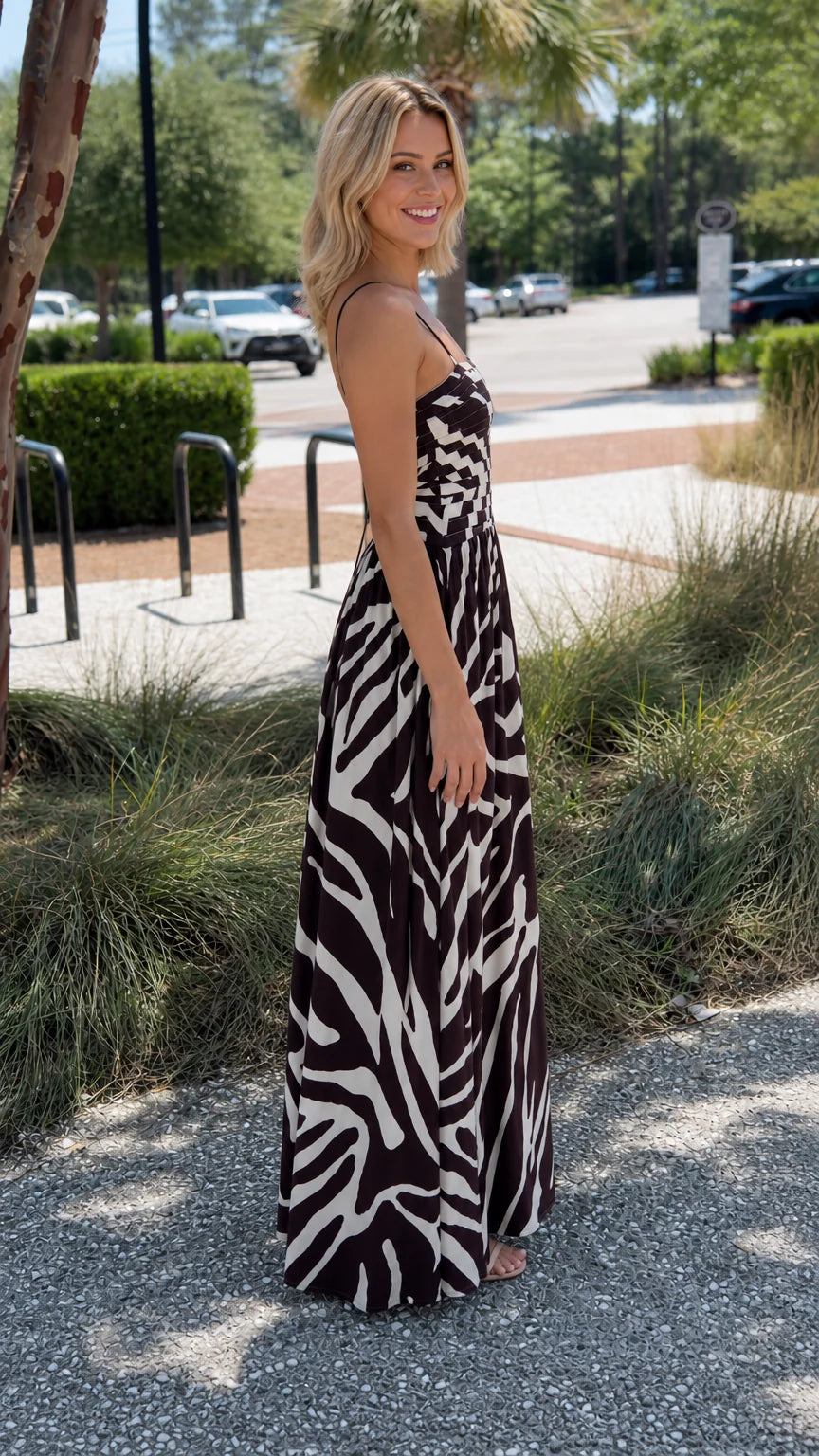 Side profile of black abstract print maxi dress