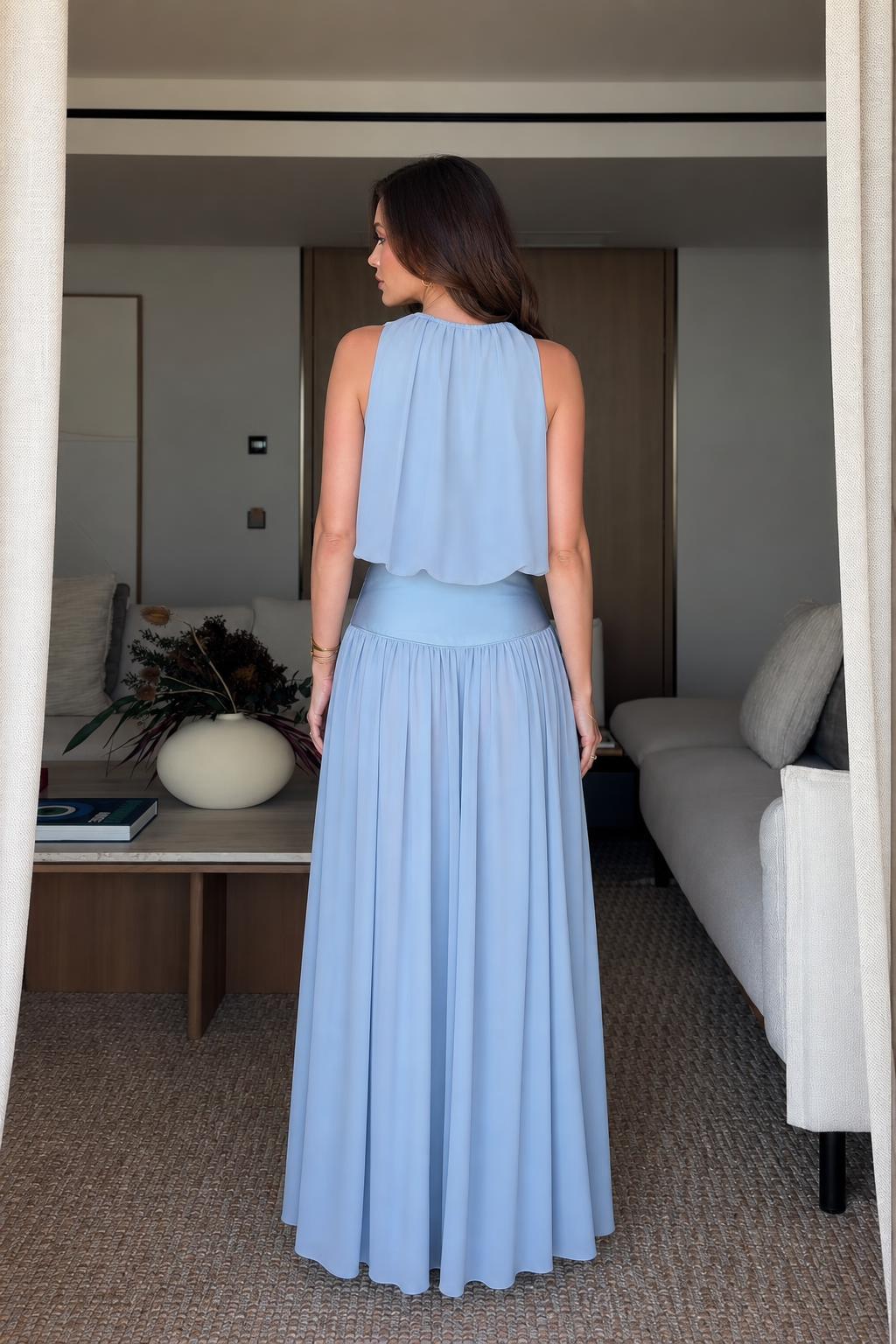 Model back view in light blue two-piece set