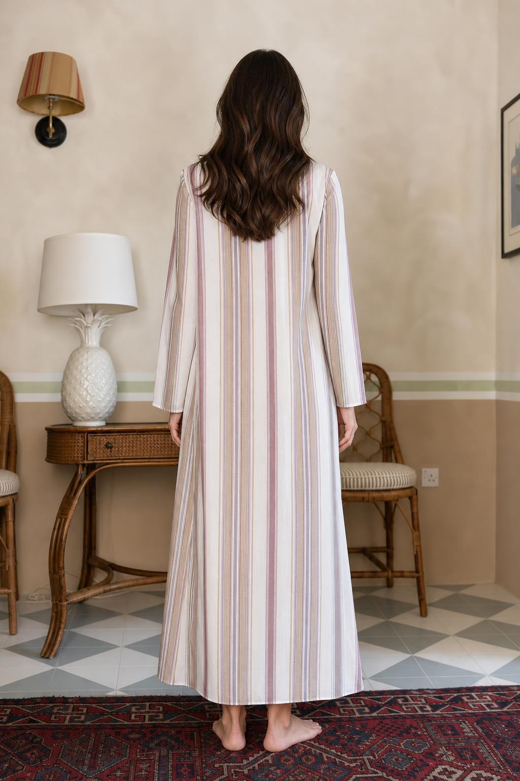 Back view of model wearing multi-stripe long sleeve maxi dress