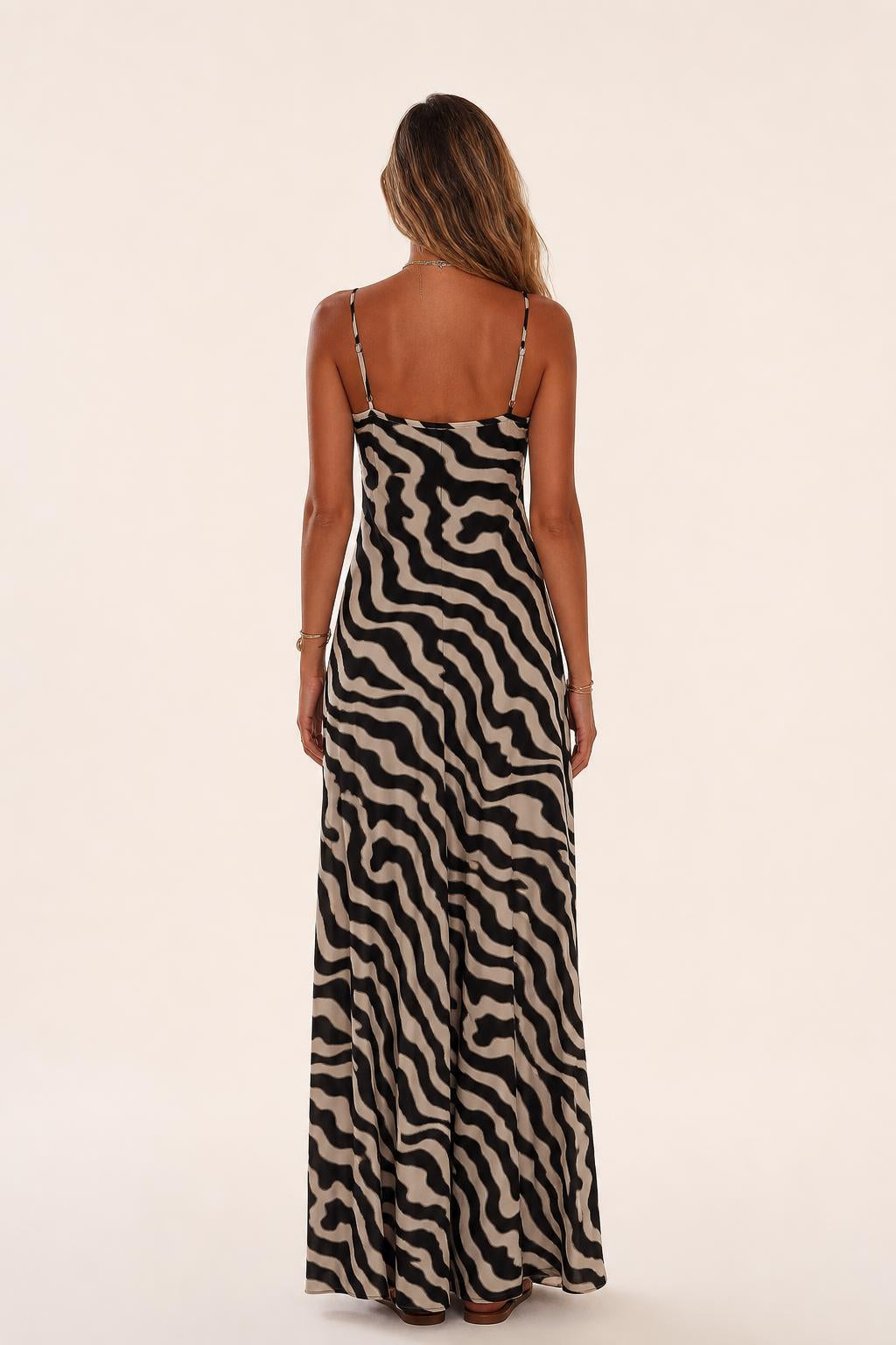 Back view of black zebra print jumpsuit