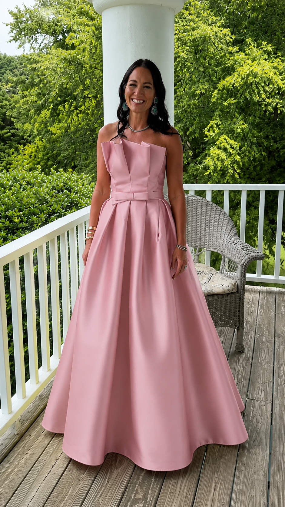 Front view of blush pink strapless A-line formal maxi gown