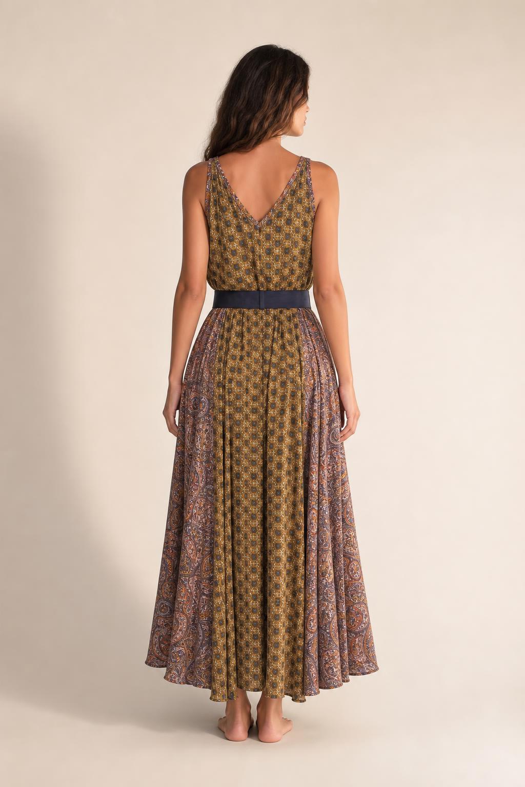 Back view of woman showcasing the fit of the mustard maxi dress
