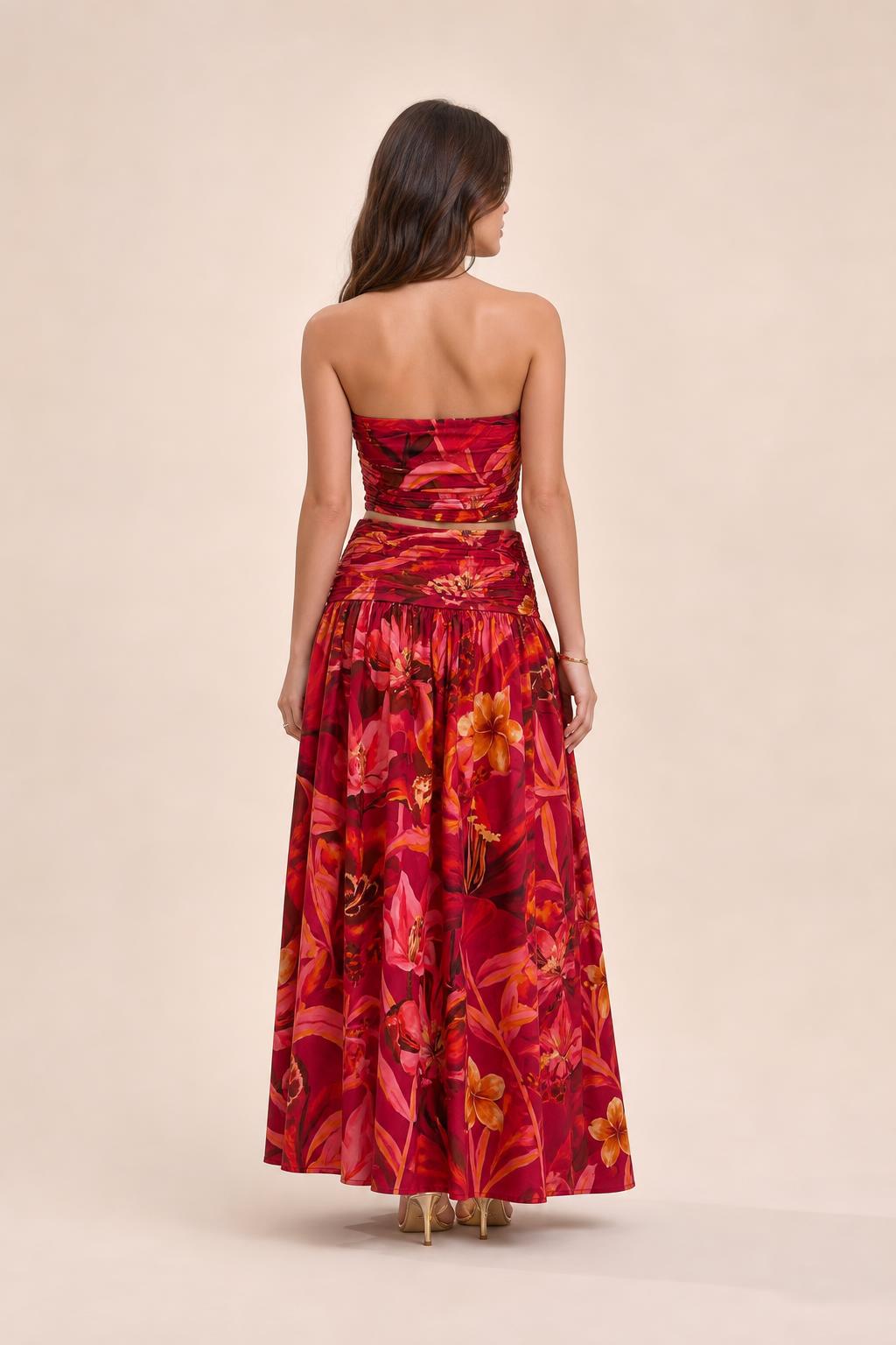 Model wearing red floral two piece set back view