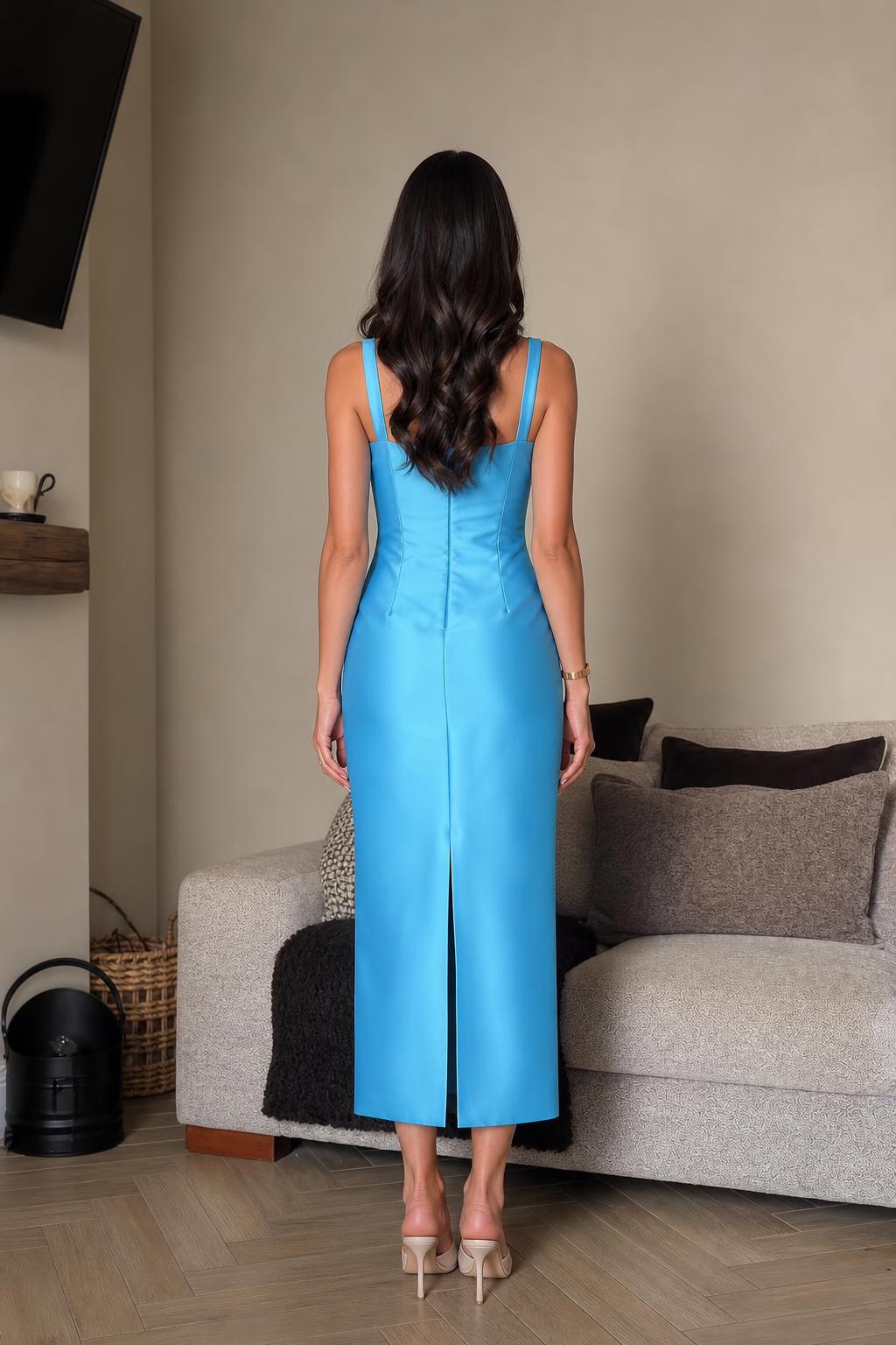 Back view of blue floral midi dress showing rear slit