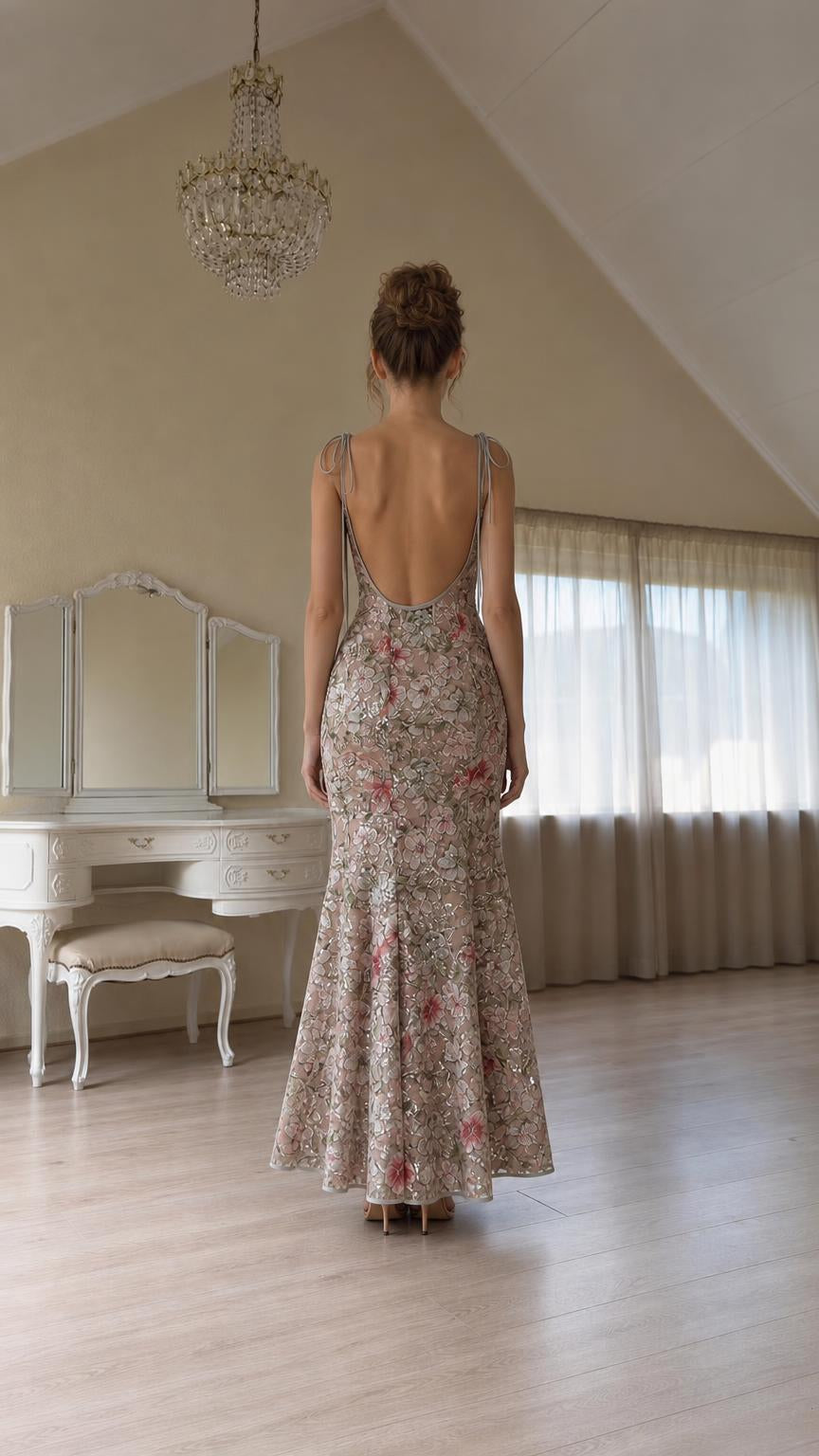 Back view of model showing open back and tie straps