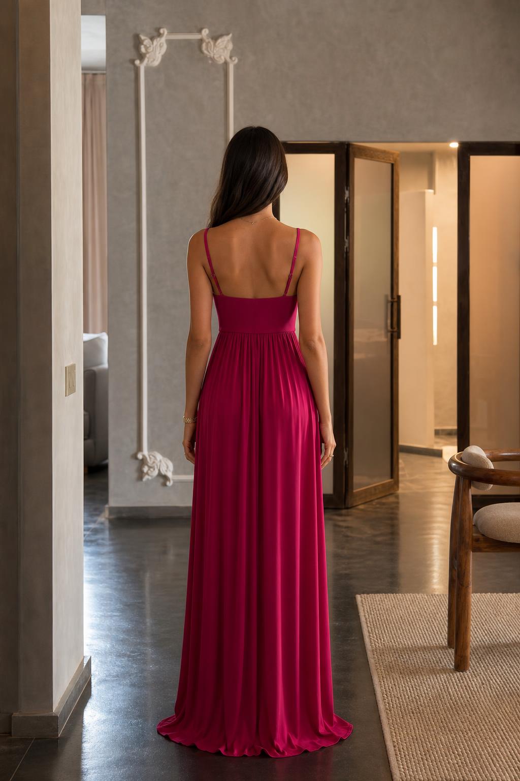 Back view showing the clean drape of the fuchsia dress