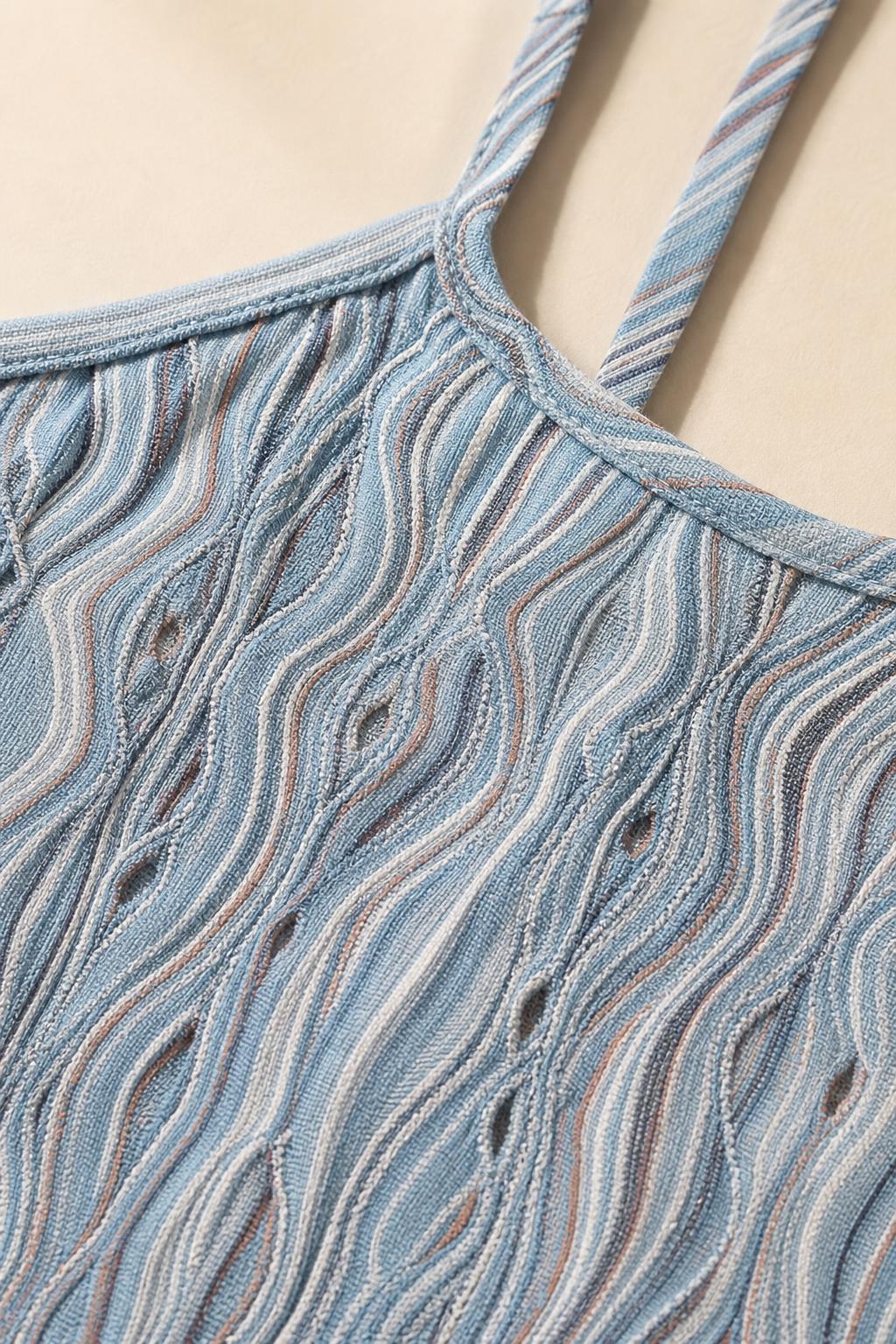 Close-up detail of blue and white wavy knit fabric and straps