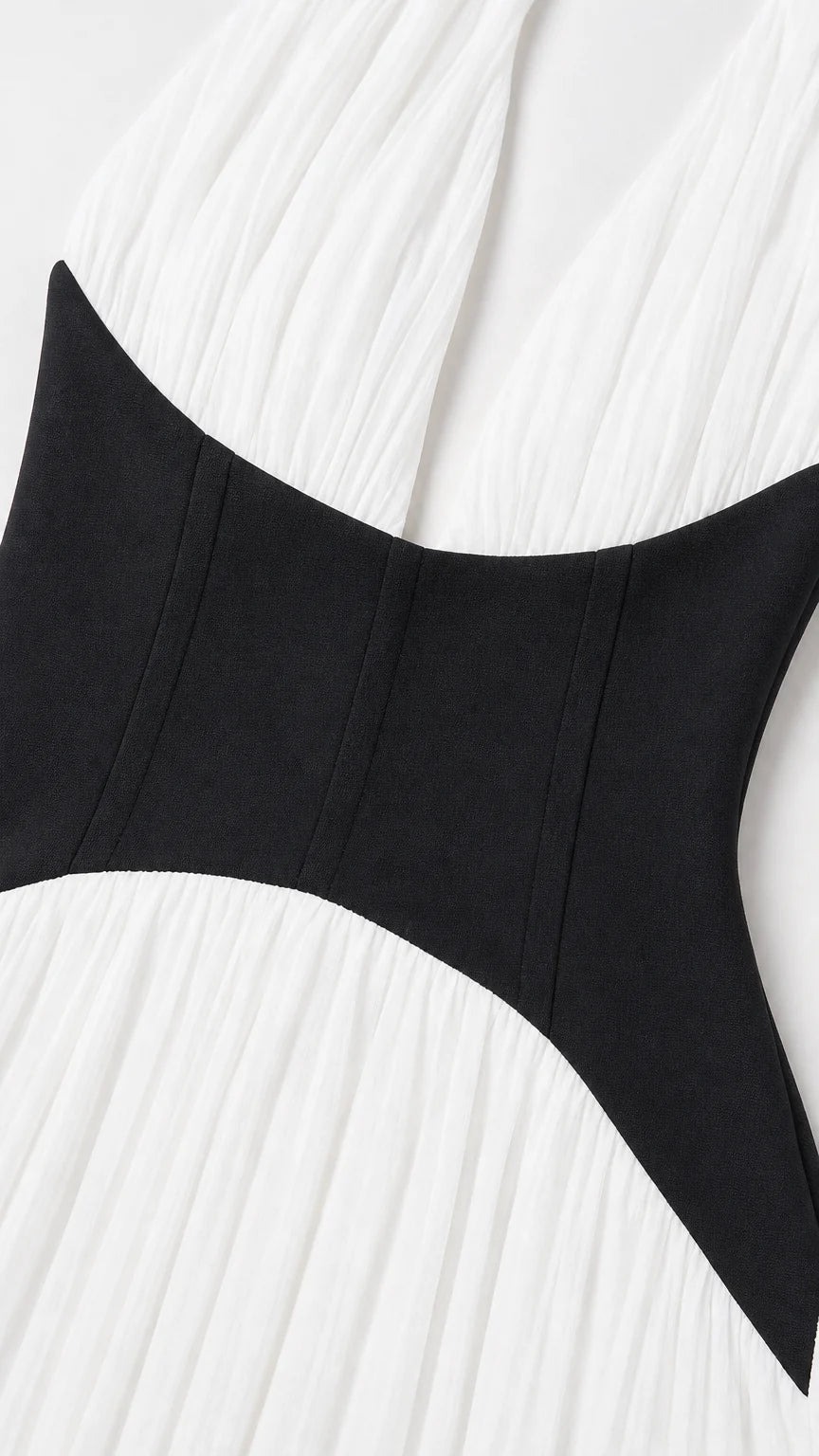Close-up detail of contrast corset waist on dress