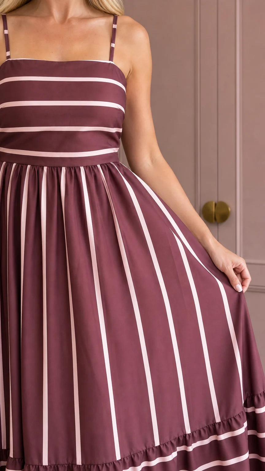 Close-up of bodice and striped pattern on burgundy maxi dress