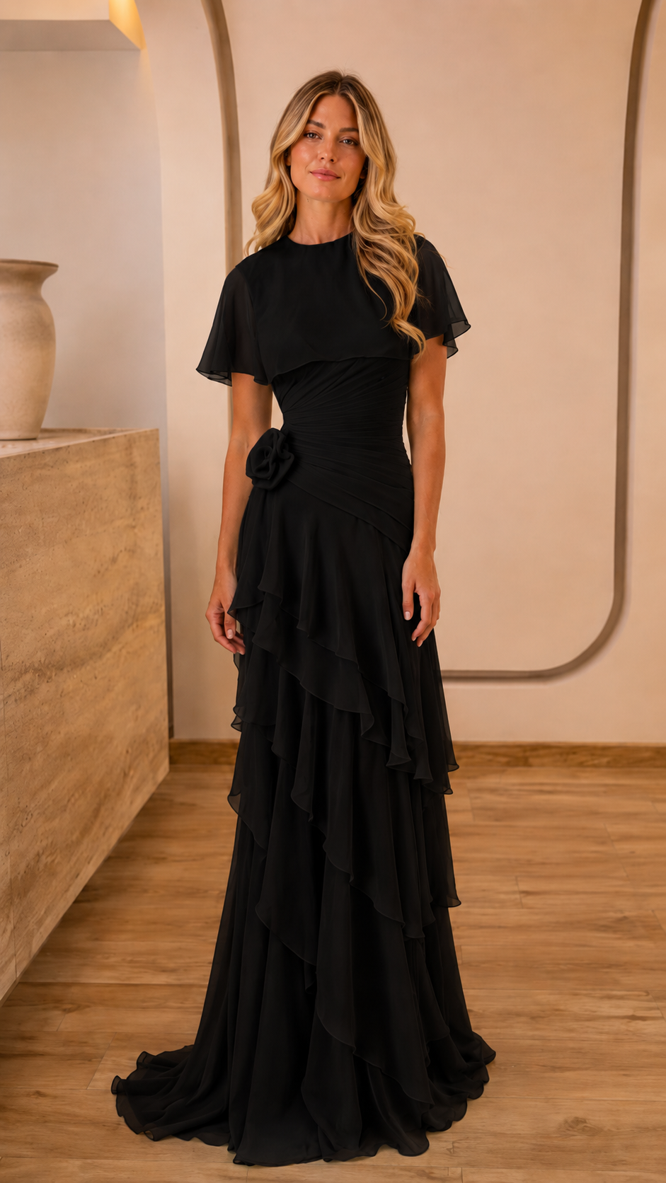 Front view of black flutter sleeve tiered ruffle maxi dress