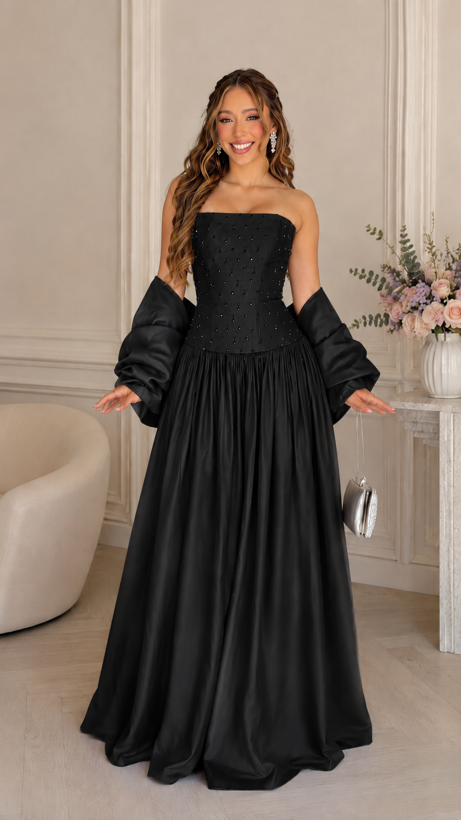 Front view of black strapless beaded bodice maxi gown with matching shawl