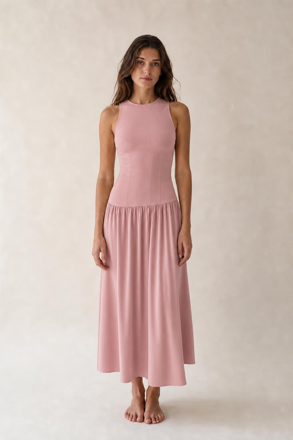 Front view of woman wearing Dusty Pink sleeveless midi dress