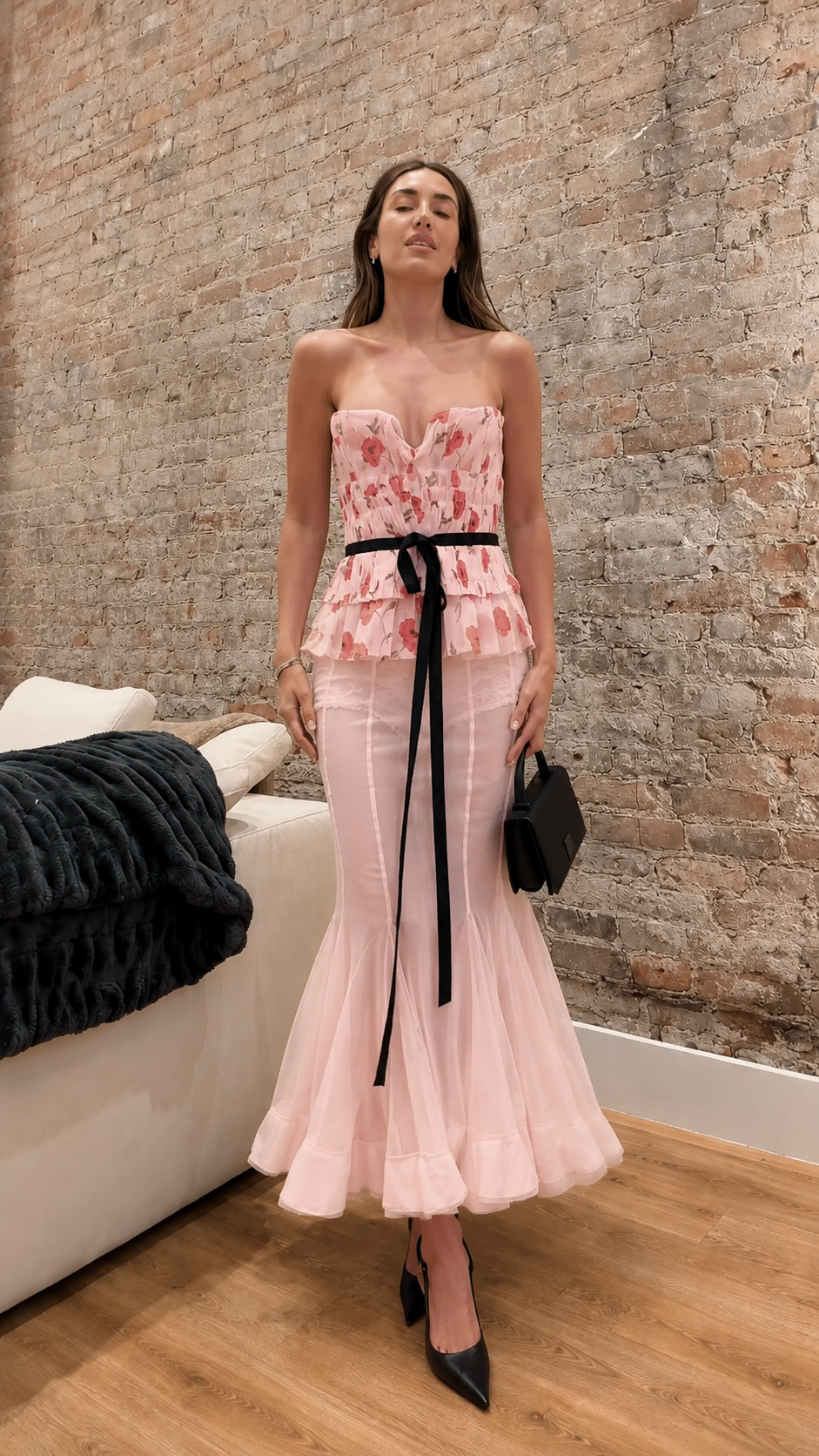 Front view of blush pink strapless floral peplum mermaid maxi dress