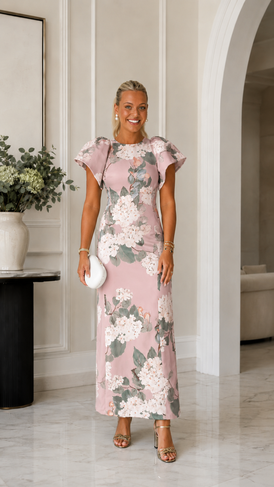 Front view of blush pink floral flutter sleeve maxi dress