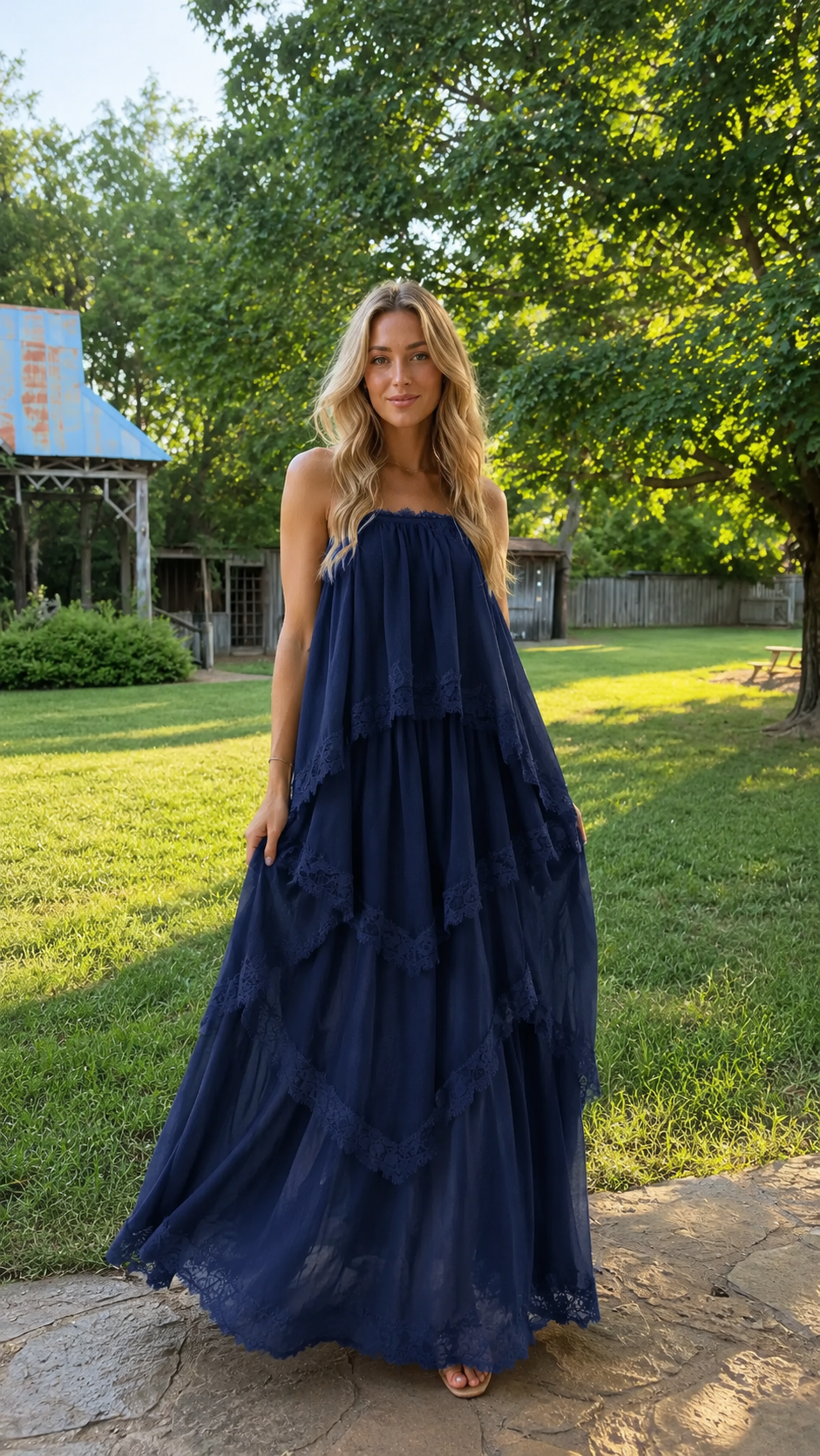 Navy tiered lace trim maxi dress with maxi-length flowing skirt front view