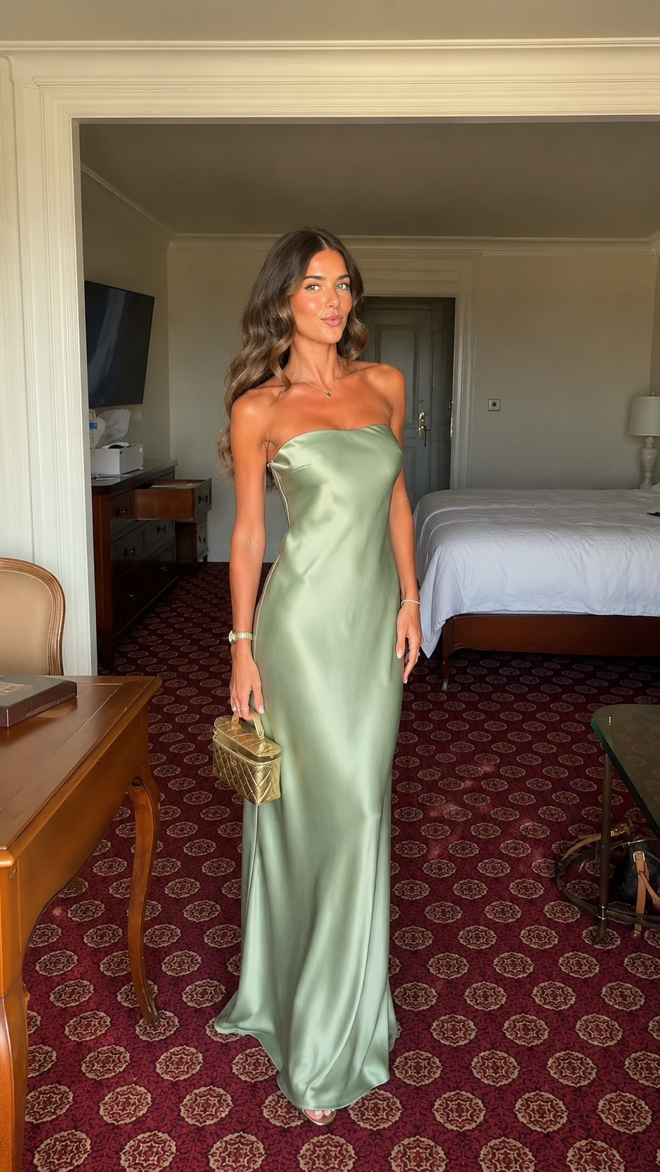Front view of sage green strapless satin-look maxi dress