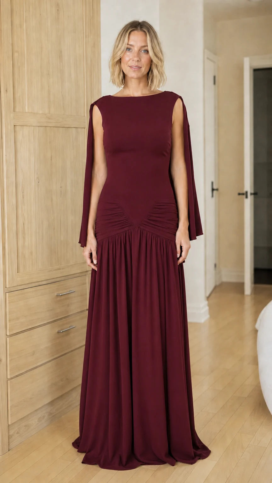 Front view of woman wearing deep burgundy formal evening dress