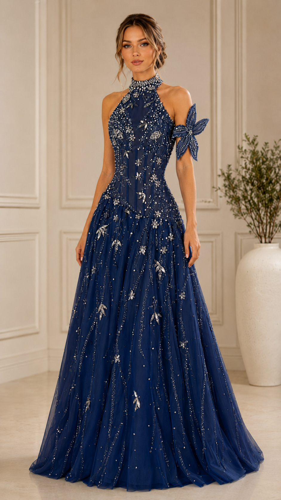 Front view of navy embellished halter A-line evening gown