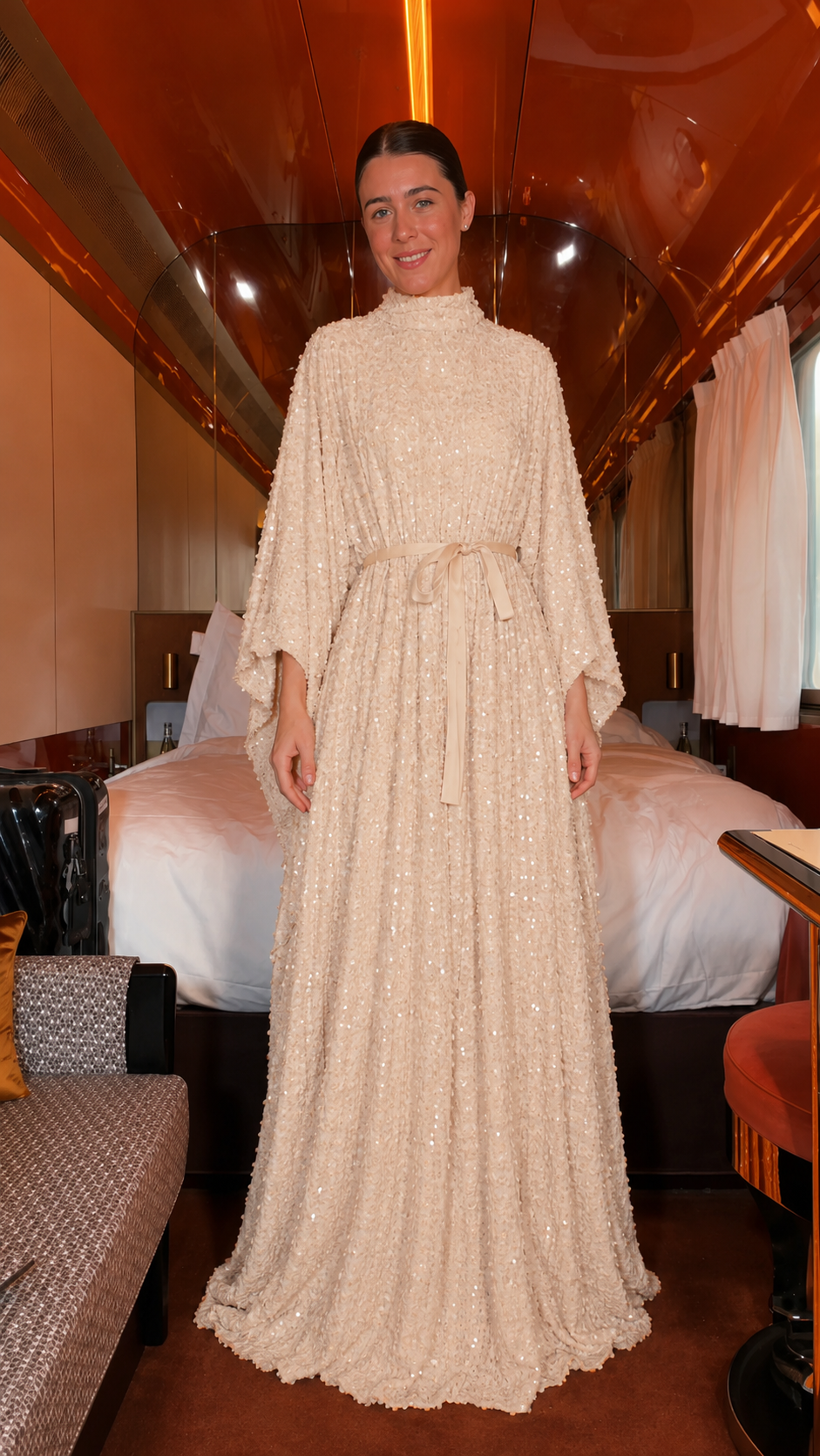 Front view of champagne textured embellished belted maxi caftan dress