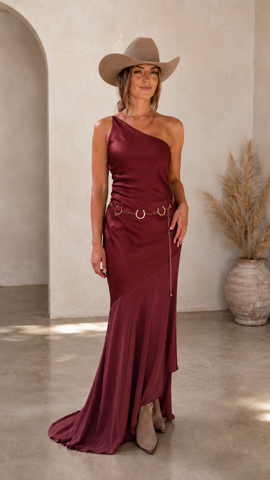 Front view of burgundy one-shoulder satin-look maxi dress with asymmetrical skirt